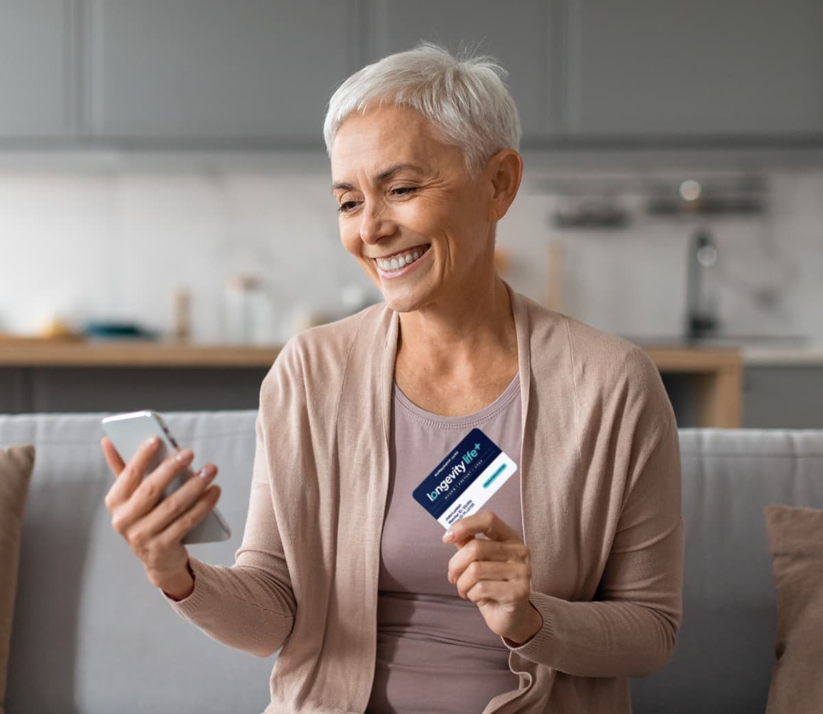 Longevity Life+ membership card design showing a member holding the card in their hand